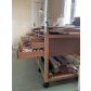 Table atelier auboi confection rouleaux cuir Besançon