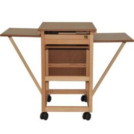 The sewing cabinet features a clean design with spacious drawers for storage.