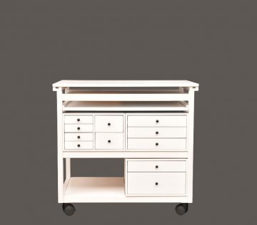 Closed white Couture workshop cabinet with 11 black lens drawers